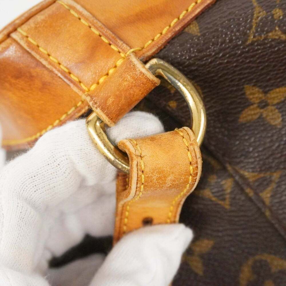 LOUIS VUITTON Brown Monogram Backpack - Picture 9 of 16